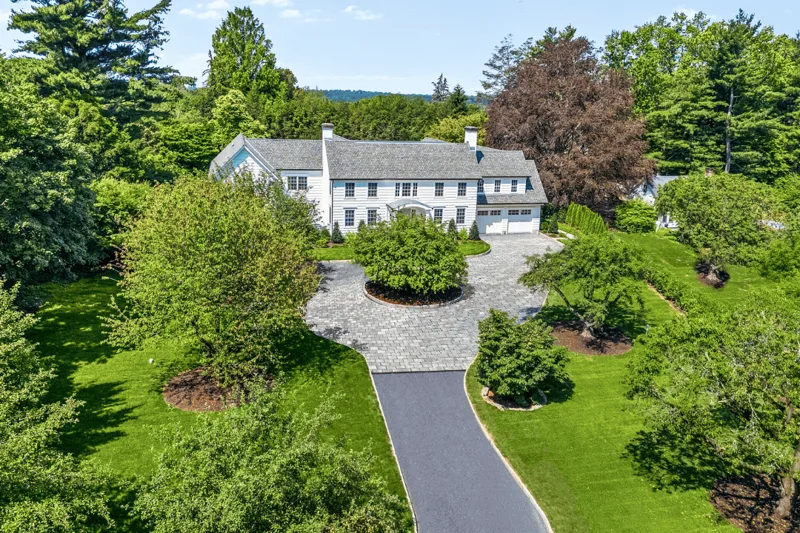 Aerial view of the circular drive and front of the residence