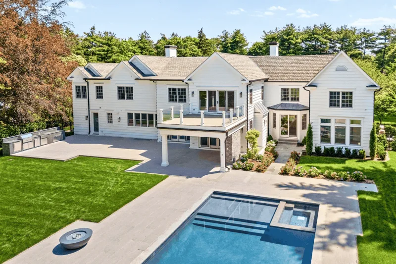 Rear of the residence with terrace and pool
