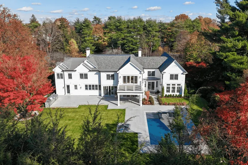 The residence and pool in fall